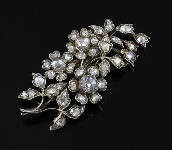 An antique gold and rose cut diamond set foliate spray brooch,